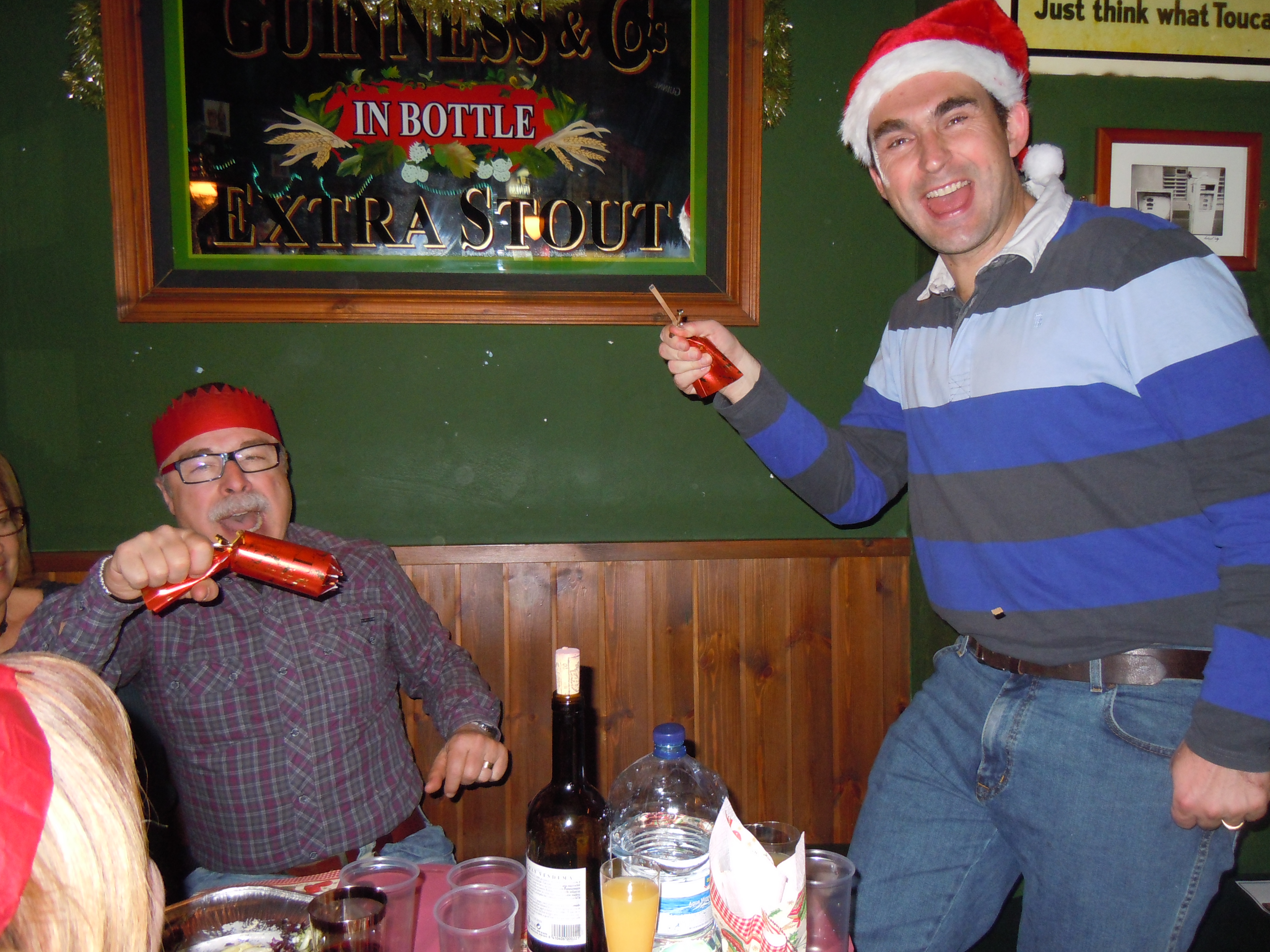 Pulling a Christmas cracker.